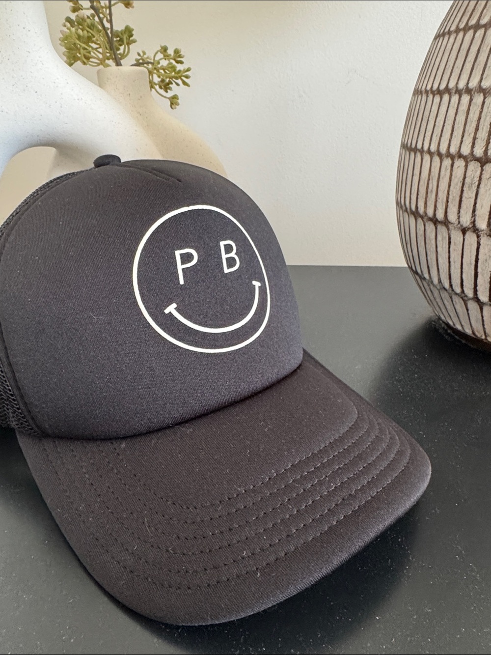 Spiritual Gangster, Black Smiley Trucker Hat with PB Logo (pure barre)